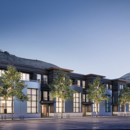 The exterior of The Glenwood glows at dusk.