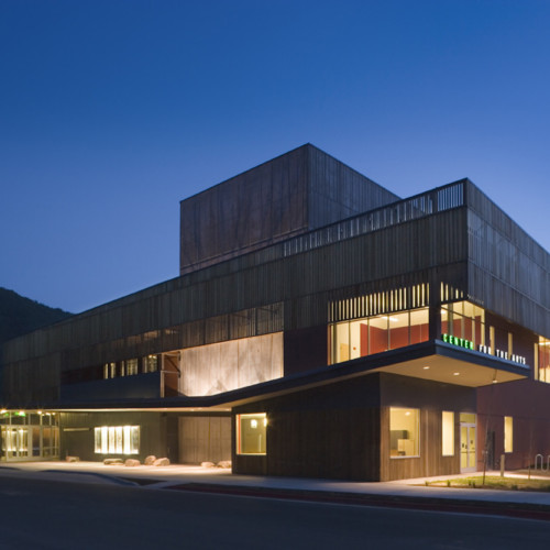 The Center for the Arts lit up at night.